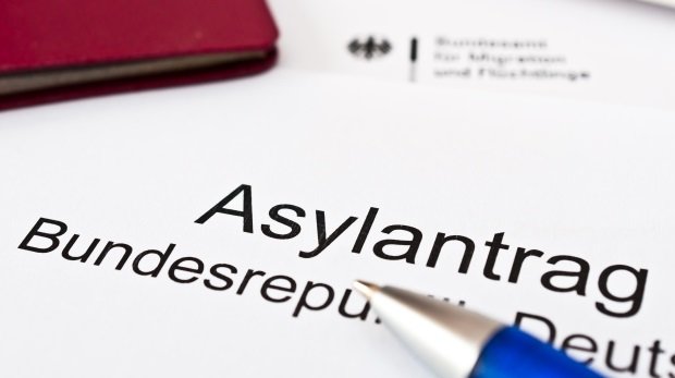 Asylantrag Deutschland (Symbol)