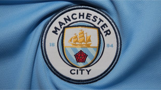 Fußballtrikot mit dem Logo von Manchester City