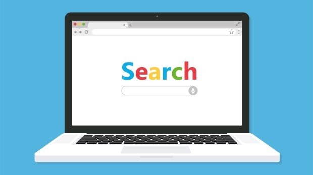 Ein Laptop mit Suchfeld und bunten Buchstaben "Search"