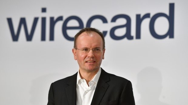 Markus Braun vor einem Wirecard-Logo